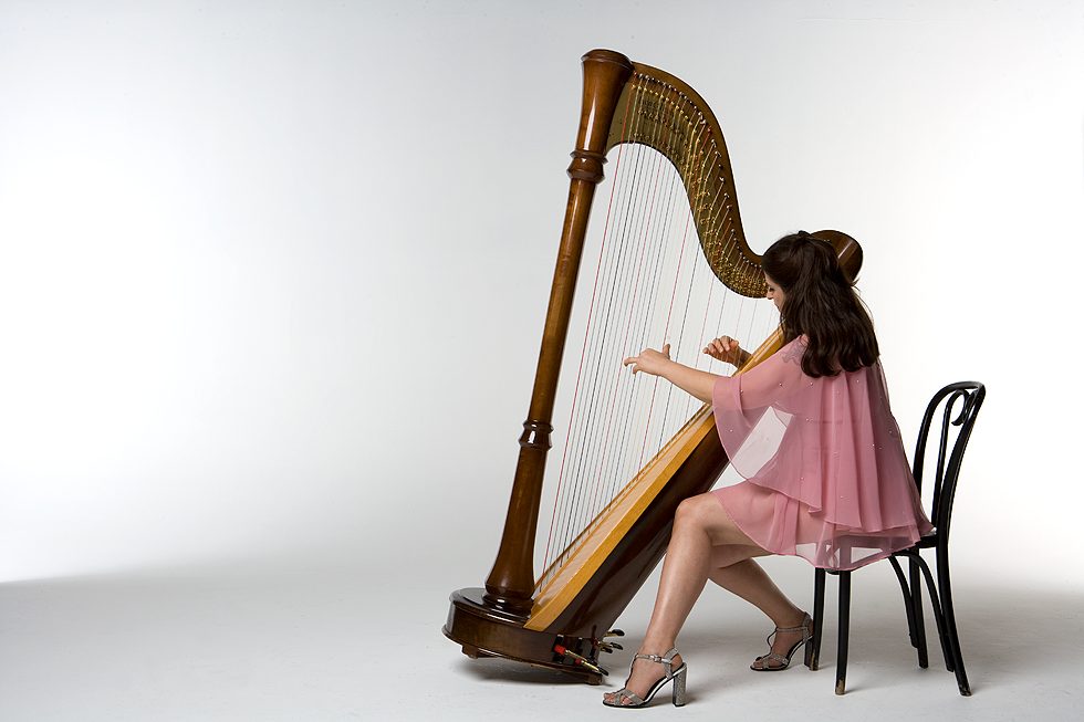 Mia Theodoratus playing the pedal harp
